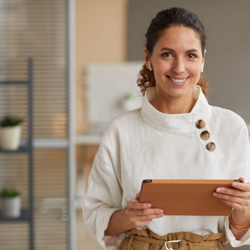 portrait-of-modern-businesswoman-holding-tablet-SWHSPWH.jpg portrait-of-modern-businesswoman-holding-tablet-SWHSPWH.jpg